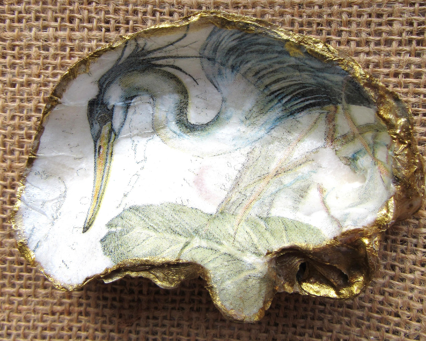 Handpainted decoupaged and gilded oyster shell dish