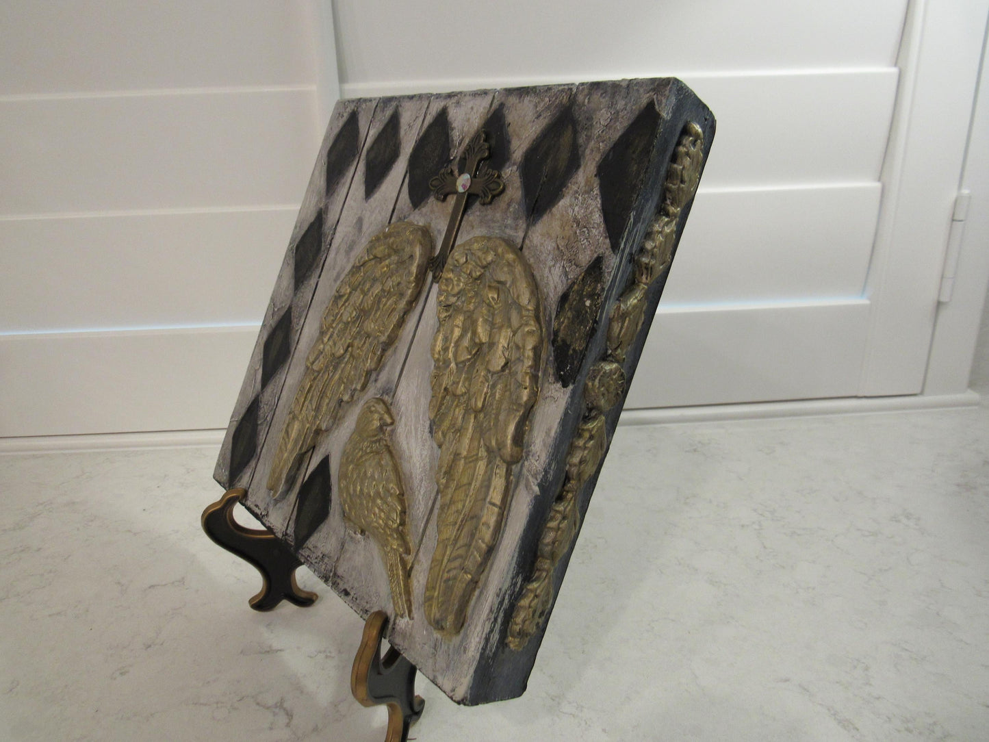 Handmade angel wings and bird decorative picture on wood