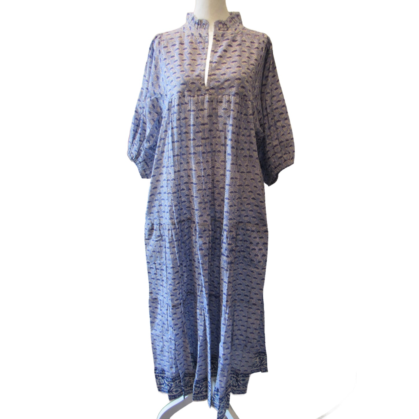 Front view of blue floral block print dress on mannequin