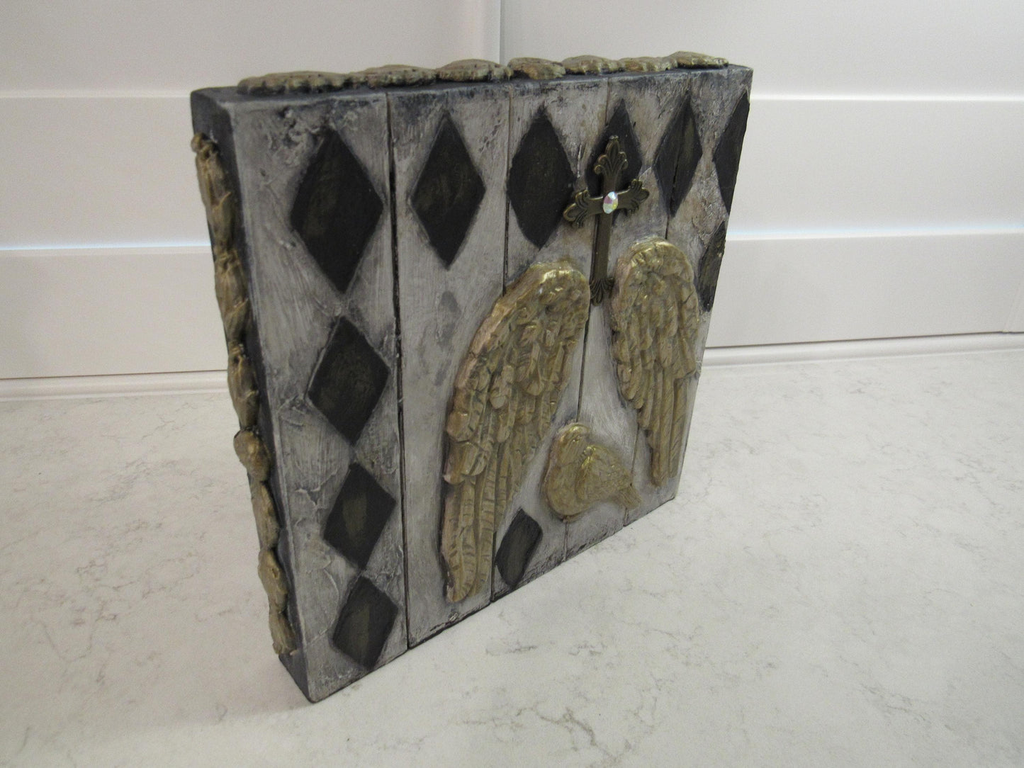 Handmade angel wings and bird decorative picture on wood