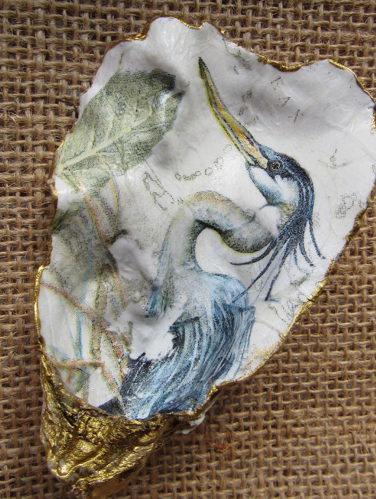 Handpainted decoupaged and gilded oyster shell dish