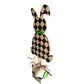 Black and off white checkered handmade wood bunny or egg home decor on a stand