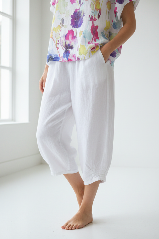 White linen cropped balloon pants - fabric detail and relaxed fit close-up