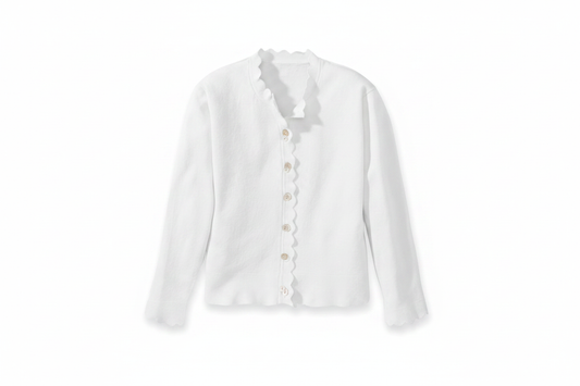 White scallop trimmed shrug flat lay
