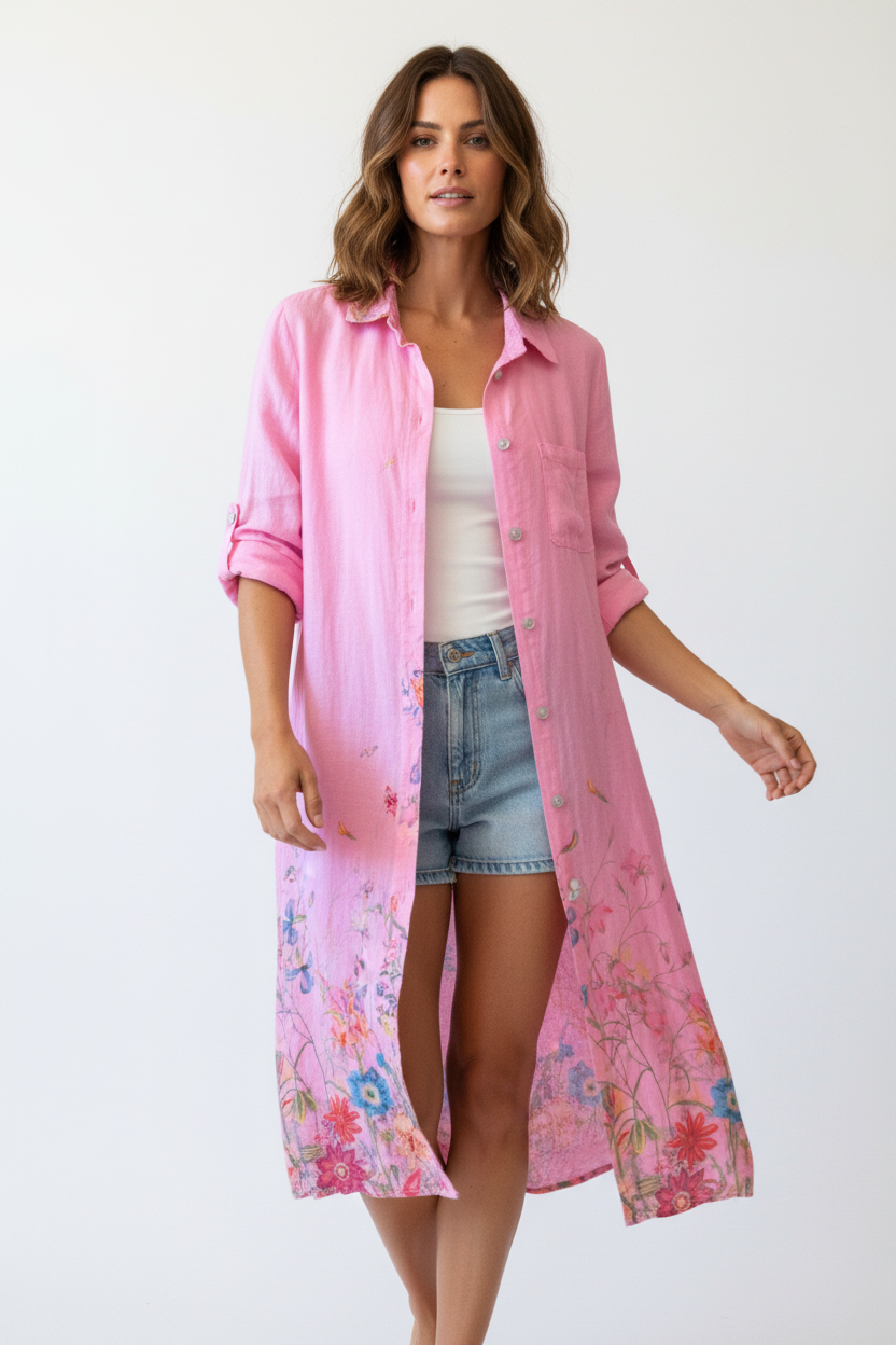 Close-up of botanical floral print on pink linen duster dress