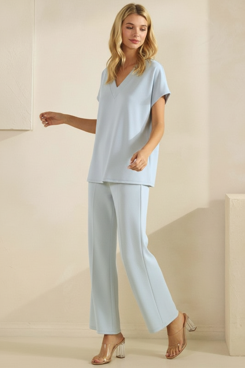 Light blue V-neck top movement pose